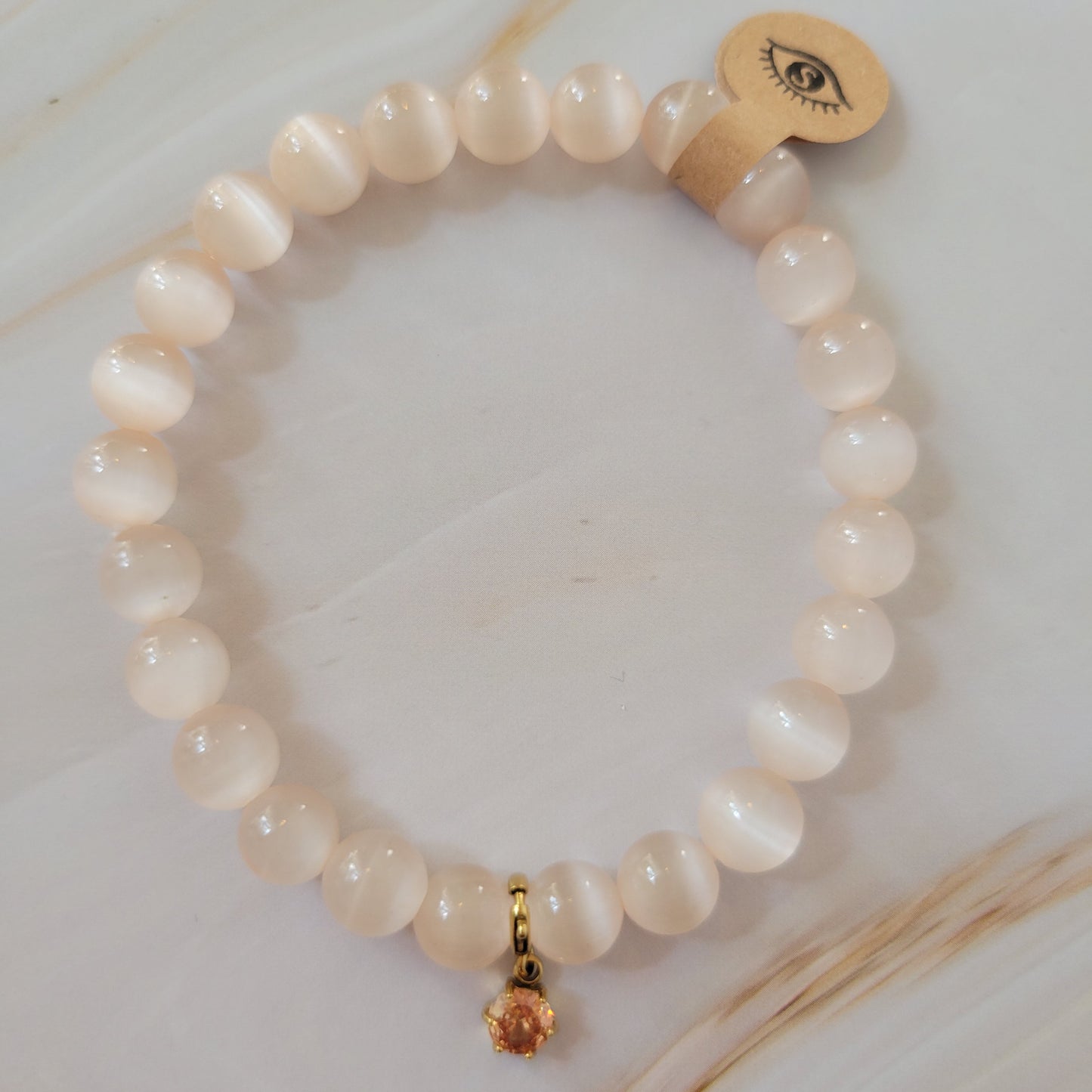 Armband mit natürlichem Cat's Eye Stein – weiß / rosé schimmer mit Diamant Charm