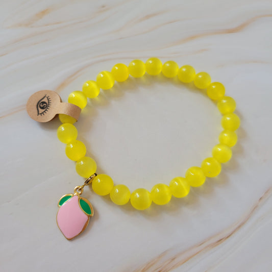 Armband mit natürlichem Cat's Eye Stein – gelb mit rosa Limone Edelstahl Charm