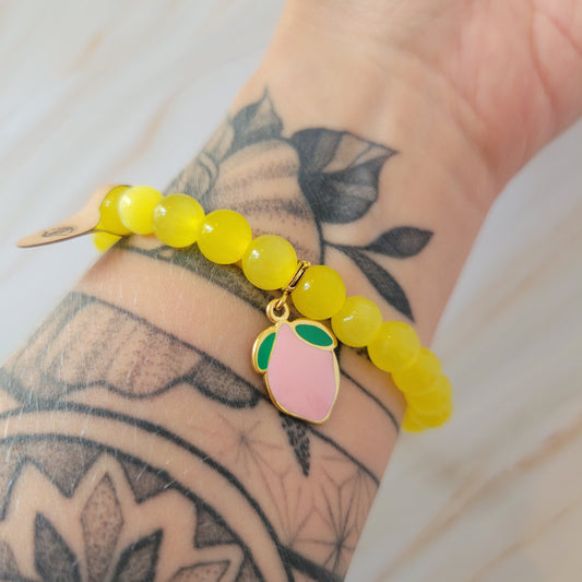 Armband mit natürlichem Cat's Eye Stein – gelb mit rosa Limone Edelstahl Charm