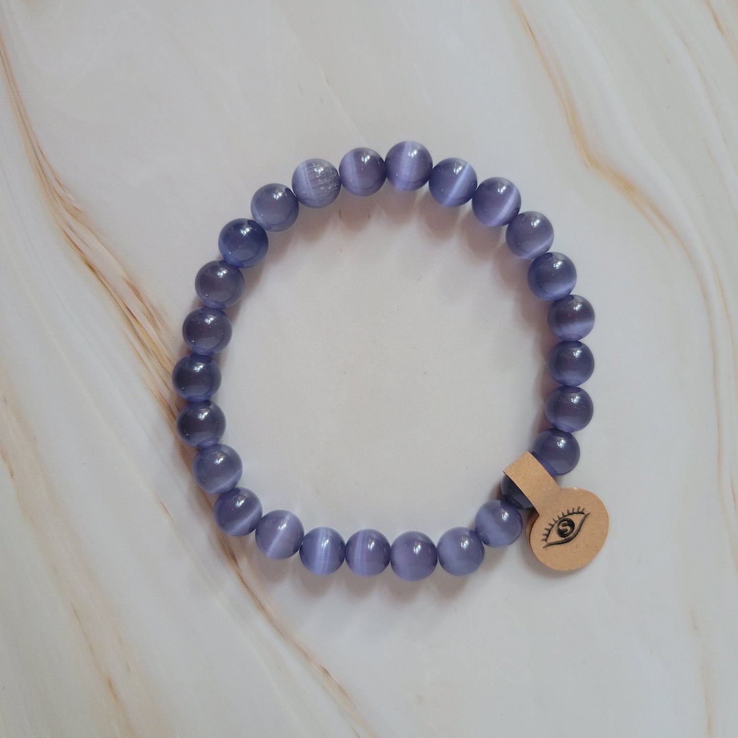 Armband mit natürlichem Cat's Eye Stein – lila