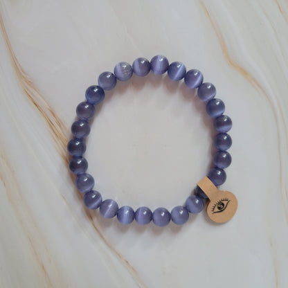 Armband mit natürlichem Cat's Eye Stein – lila